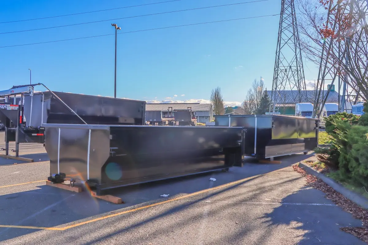 Roll-off dumpster ready for waste disposal at job site for 4 Yard Dumpster Rental in Clay